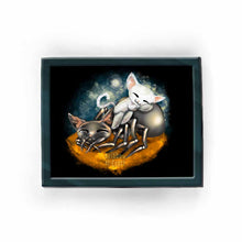 Load image into Gallery viewer, an art print featuring an illustration of a sleeping black cat painted as a funnel web spider, and a white cat curled up on the spider cat's back, having a nap. a tiny moon shines in the background.
