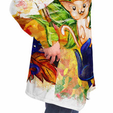 Load image into Gallery viewer, a man wearing a white cloak, printed with art of a white cat and black cat painted as autumn fairies with leaf wings
