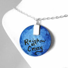 Load image into Gallery viewer, a small lightweight wood circle, hand painted with the portrait of a chihuahua as an angel in the clouds. available as a keepsake or pendant necklace. The back is signed with, Rainbow of Crazy
