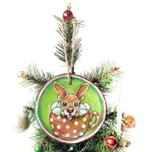 Load image into Gallery viewer, a tree ornament, hand painted with a chihuahua sitting in a mug of hot chocolate and marshmallows.
