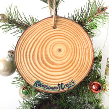 Load image into Gallery viewer, an ornament signed on the back with, Rainbow of Crazy
