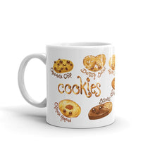 Load image into Gallery viewer, The Cookie Lovers Smile Mug in 11 oz size, includes a graphic of 10 different cookies with cartoon faces on them
