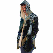 Load image into Gallery viewer, a man wearing a navy blue and orange cloak, featuring art from the Eight of Cups card, from the Animism Tarot: a magpie, with wings spread, flies up into the night sky.
