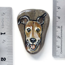 Load image into Gallery viewer, hand painted rock art of a smiling brown greyhound dog, next to two rulers to show its size: 1 3/4" x 1 5/16" or 4.5 cm x 3.3 cm
