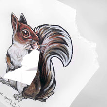 Load image into Gallery viewer, a greeting card featuring an illustration of a red squirrel. the right corner of the front of the card has been ripped off and is attached to the squirrel's mouth. the card reads, "I got you a card! ...but I eated it"
