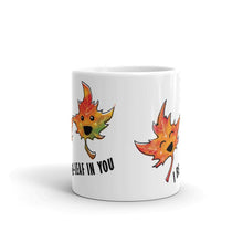 Load image into Gallery viewer, A 11 oz white ceramic mug, printed with art of two maple leaves with happy faces, and the words. "I be-leaf in you"
