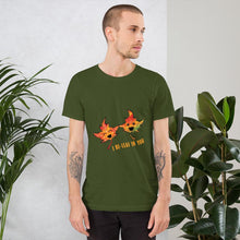 Load image into Gallery viewer, A man wearing the I Believe in You Leaf Premium Unisex T-Shirt in the colour olive green, which includes art of two maple leaves and the words, "I be-leaf in you"
