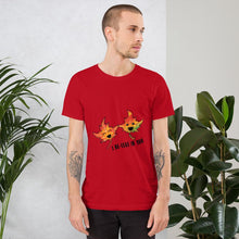 Load image into Gallery viewer, A man wearing the I Believe in You Leaf Premium Unisex T-Shirt in the colour red, which includes a graphic of two maple leaves and the words, "I be-leaf in you"
