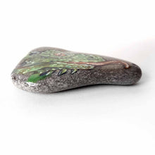 Load image into Gallery viewer, A triangle shaped stone, painted with a portrait of a green iguana
