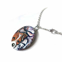 Load image into Gallery viewer, a small wood circle, hand painted with a jack russell terrier dog, curled up sleeping. available as a wood keepsake or pendant necklace
