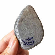Load image into Gallery viewer, the back of a small rock of a Javanese cat, signed with, Rainbow of Crazy
