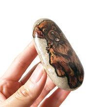 Load image into Gallery viewer, a beach stone painted with a brown Newfoundland dog
