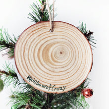 Load image into Gallery viewer, The back of the chicken ornament, signed with "Rainbow of Crazy"
