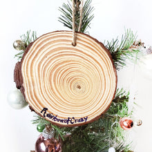 Load image into Gallery viewer, The back of a Havanese dog wood ornament, signed with, Rainbow of Crazy
