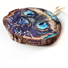 Load image into Gallery viewer, A Siamese cat ornament signed on the bottom right with "Rainbow of Crazy"
