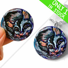 Load image into Gallery viewer, A painting of a sleeping sugar glider, hand painted on a small, smooth, wood circle. Available as a keepsake art or pendant necklace
