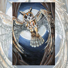 Load image into Gallery viewer, an art print of the high priestess tarot card from the animism tarot: a striped owl, with wings spread, flies in between two trees with the full moon shining behind her.
