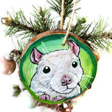 Load image into Gallery viewer, A Christmas wood ornament, hand painted with art of a white fancy rat, in front of a green background
